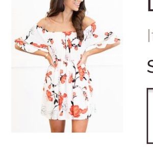Shoulder floral dress, never worn- no tags